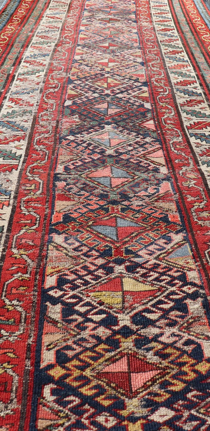 Distressed Medallion Antique Caucasian Kazak Rug with Geometric Medallions Distressed Geometric Medallion antique Caucasian Kazak rug in lighter tones. Keivan Woven Arts / rug KBE - 220101, country of origin / type: Iran / Caucasian Kazak, circa 1... - Keivan Woven ArtsKBE - 220101 - 19088