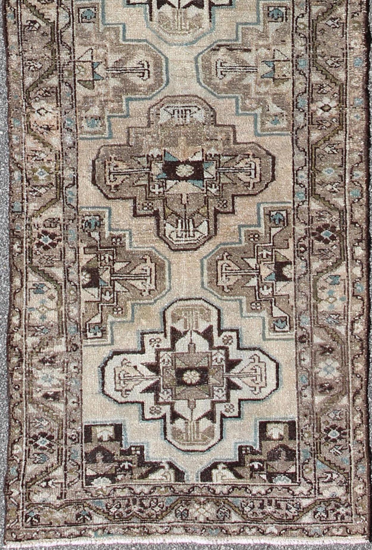 Antique Persian Hamadan runner with stacked medallion in taupe, ivory, blue, rug kbe - h - 701 - 11, country of origin / type: Iran / Hamadan, circa 1900 This antique Persian Hamadan long runner from early 20th century Iran features a vertical arrange... - Keivan Woven ArtsKBE - H - 701 - 11 - 287Rug