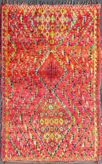 Mid - Century Tribal Moroccan Vintage Rug with Colorful, Vibrant Diamond Pattern Measures: 6'8'' x 10'6''. This Moroccan rug has a vibrant all - over diamond geometric pattern with navy blue outlines, set on a field shaded with orange and red. Th... - Keivan Woven ArtsKBE - LCB - 136650 - 7345Rug