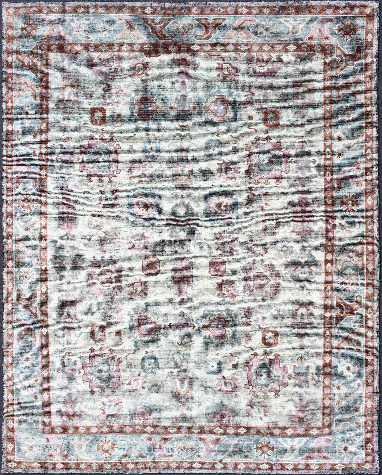 Multi - Colored Transitional Design Distressed Rug in Ivory, Blue, Lavender. Distressed multi colored design Indian piled rug, rug KHN - 1026 - TR - 781, country of origin / type: India / Modern Piled Rug. A unique blend of historical and modern des... - Keivan Woven ArtsKHN - 1026 - TR - 781 - 13540Rug