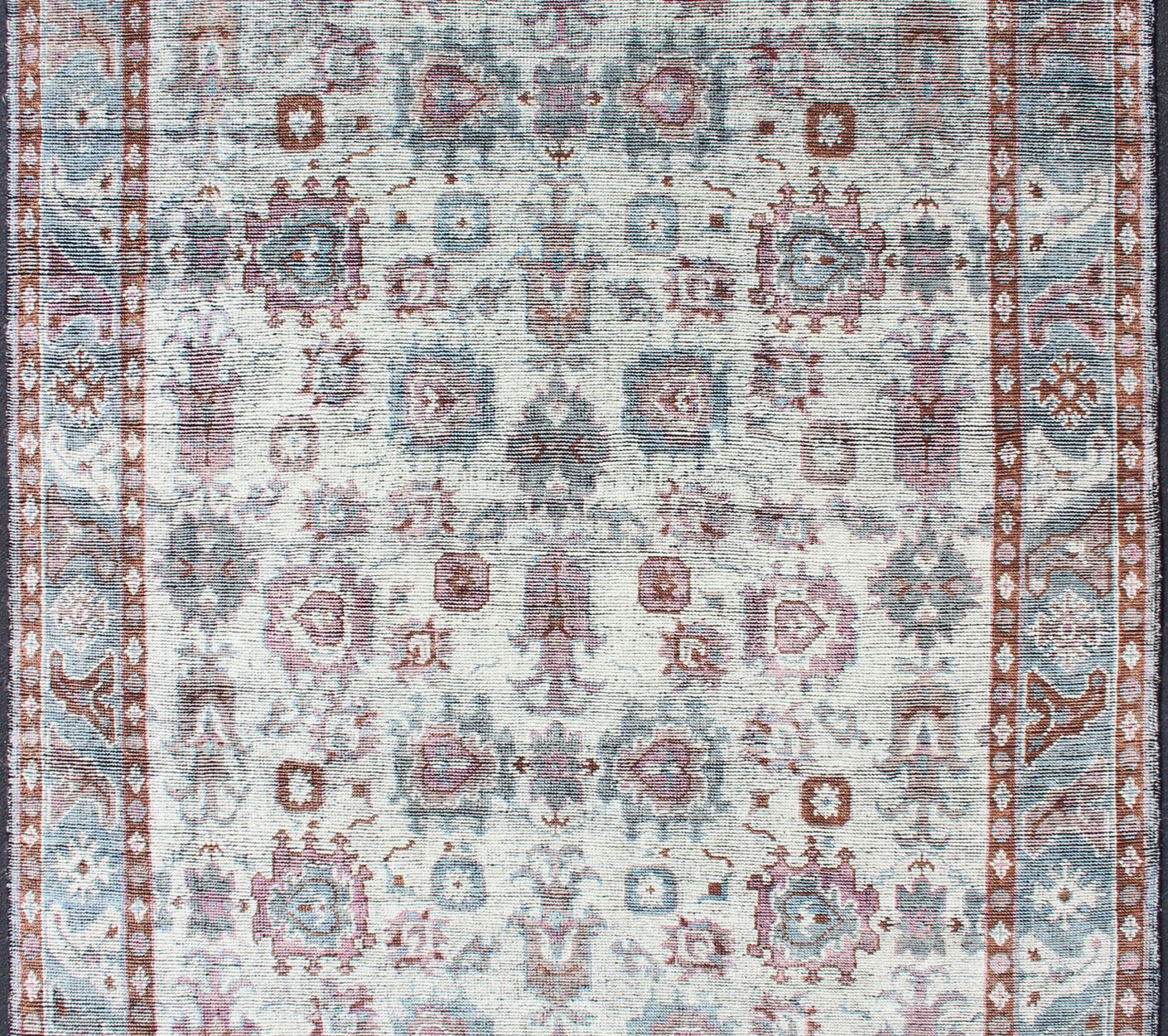 Multi - Colored Transitional Design Distressed Rug in Ivory, Blue, Lavender. Distressed multi colored design Indian piled rug, rug KHN - 1026 - TR - 781, country of origin / type: India / Modern Piled Rug. A unique blend of historical and modern des... - Keivan Woven ArtsKHN - 1026 - TR - 781 - 13540Rug