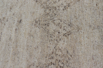 Moroccan Styled Diamond Design on All - Beige Modern Area Rug Measures 13'0 x 17'8 This modern rugs field is rendered in a blend of cream and beige, while the design is a gray. The vertical diamonds loosely resemble that of Moroccan triba... - Keivan Woven ArtsKHN - 34906 - TR - 1057 - 21024Rug