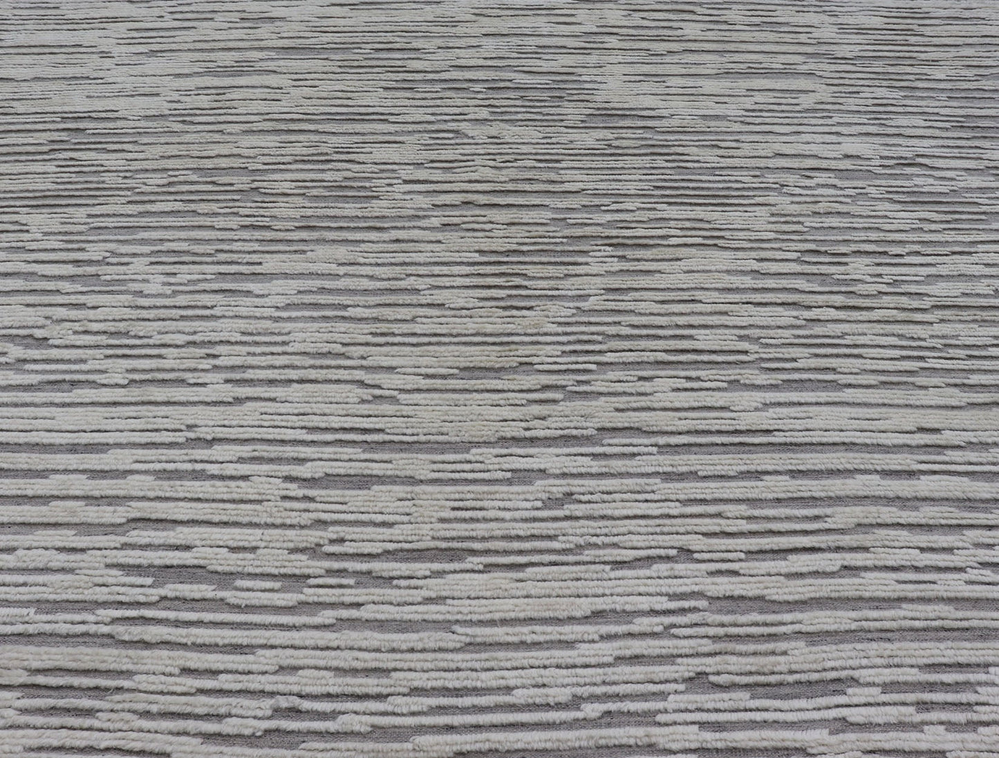 Measures 11'8 x 14' This Squared shape modern area rug was hand - knotted. Common with modern rugs, this piece features hi low and no defined border in neutral colors such as off white, cream, gray taupe. The field is a wood grain - like pattern, ut... - Keivan Woven ArtsKHN - 43558 - TR - 857 - 20866Rug