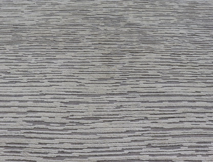 Measures 11'8 x 14' This Squared shape modern area rug was hand - knotted. Common with modern rugs, this piece features hi low and no defined border in neutral colors such as off white, cream, gray taupe. The field is a wood grain - like pattern, ut... - Keivan Woven ArtsKHN - 43558 - TR - 857 - 20866Rug