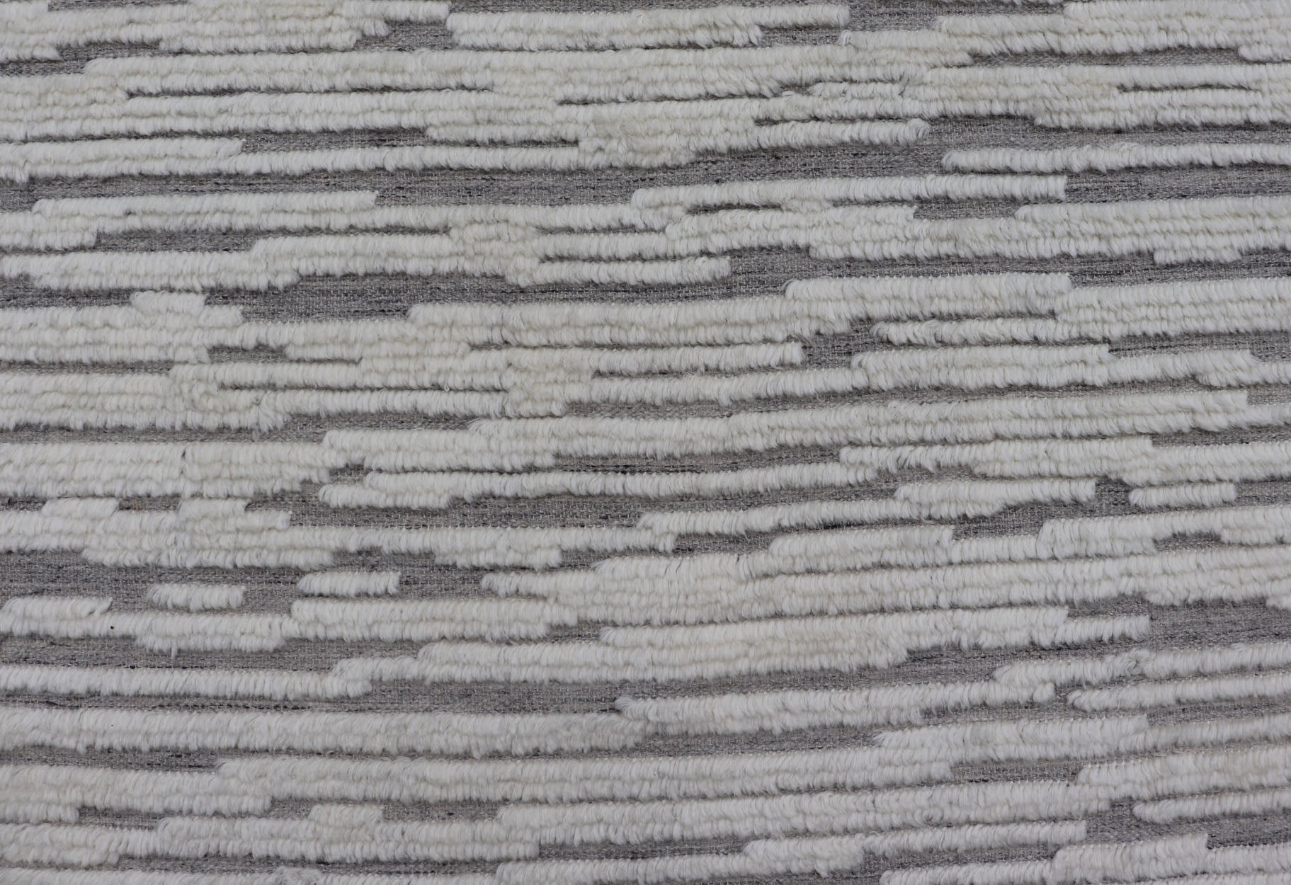 Measures 11'8 x 14' This Squared shape modern area rug was hand - knotted. Common with modern rugs, this piece features hi low and no defined border in neutral colors such as off white, cream, gray taupe. The field is a wood grain - like pattern, ut... - Keivan Woven ArtsKHN - 43558 - TR - 857 - 20866Rug