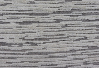Measures 11'8 x 14' This Squared shape modern area rug was hand - knotted. Common with modern rugs, this piece features hi low and no defined border in neutral colors such as off white, cream, gray taupe. The field is a wood grain - like pattern, ut... - Keivan Woven ArtsKHN - 43558 - TR - 857 - 20866Rug