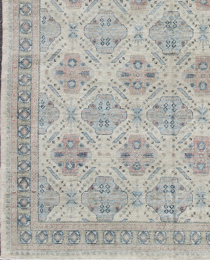 Afghan Khotan Rug with All - Over Geometric Pattern in Pink and Light Blue. Light Khotan rug with geometric Medallions, rug KOL - 67784 country of origin / type: Afghanistan / Khotan This Khotan features a geometric all - over design flanked by a ... - Keivan Woven ArtsKOL - 67784 - 8960Rug