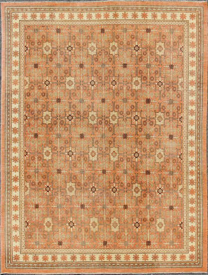 All - Over Design Khotan Rug in Light Tangerine Background. Charcoal, Brown, Green & Taupe Khotan design Rug with all over geometric and square Design in light tangerine background with accent colors of charcoal, brown, green and taupe. rug KOL - 68... - Keivan Woven ArtsKOL - 68165 - 8966Rug