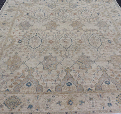 Afghan Khotan Rug with All - Over Geometric Pattern in Tan, Taupe, and Light Blue. Keivan Woven Arts / rug KOL - 69825 country of origin / type: Afghanistan / Khotan. Measures: 9'0 x 12'0 This Khotan features a geometric all - over design flanked by ... - Keivan Woven ArtsKOL - 69825 - 9114Rug