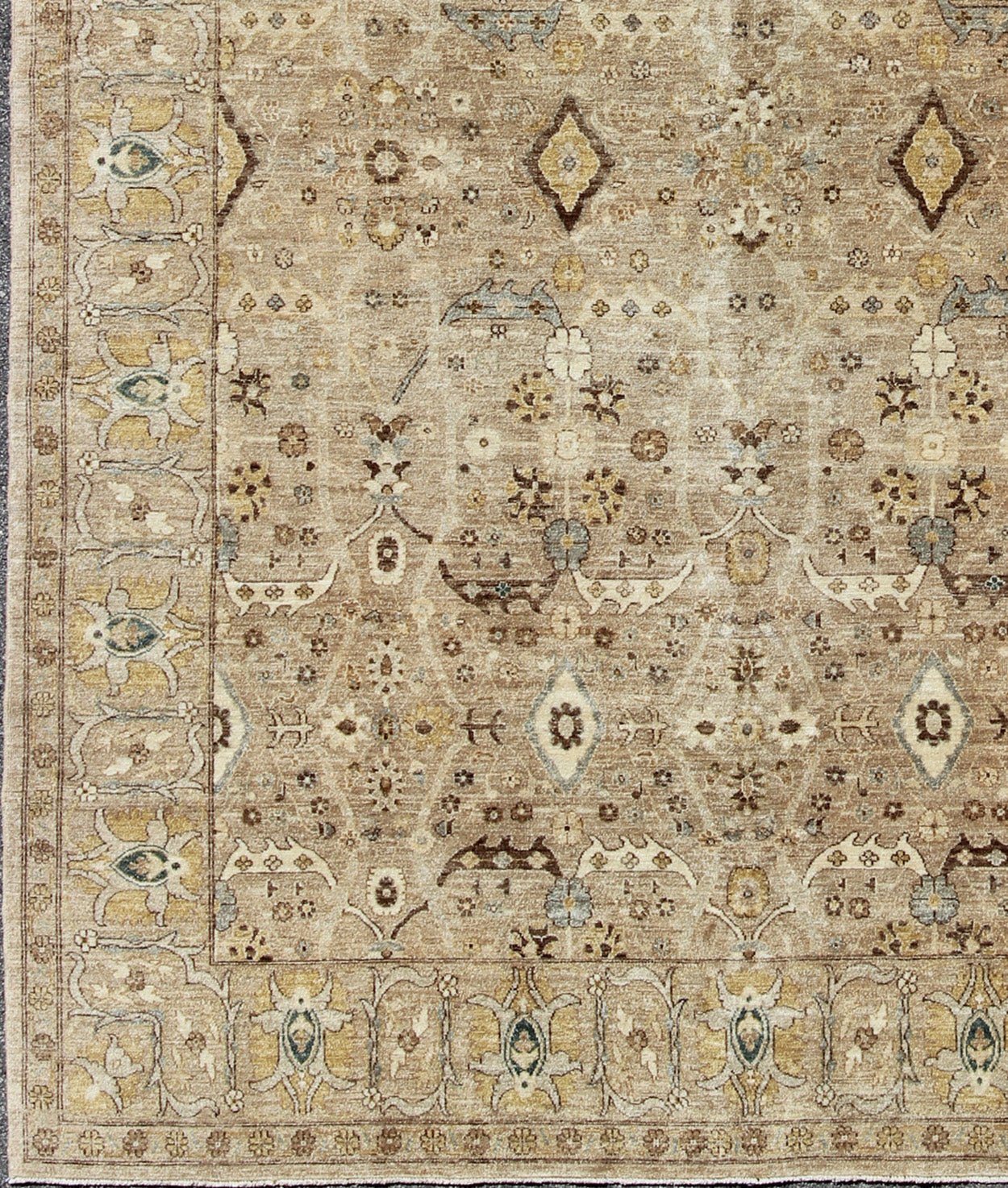 Tabriz Design rug with light Camel Background, Light Brown, tan , Light Brown, Lt. Blue, Yellow. Tabriz Design rug with light Camel Background, Light Brown, tan , Light Brown, Lt. Blue, Yellow, and neutral color palette and all - over flower desig... - Keivan Woven ArtsKOL - 69996 - 8978Rug