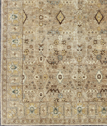 Tabriz Design rug with light Camel Background, Light Brown, tan , Light Brown, Lt. Blue, Yellow. Tabriz Design rug with light Camel Background, Light Brown, tan , Light Brown, Lt. Blue, Yellow, and neutral color palette and all - over flower desig... - Keivan Woven ArtsKOL - 69996 - 8978Rug