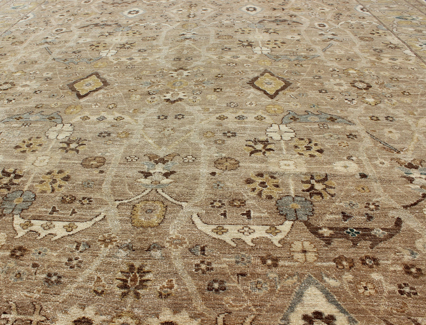 Tabriz Design rug with light Camel Background, Light Brown, tan , Light Brown, Lt. Blue, Yellow. Tabriz Design rug with light Camel Background, Light Brown, tan , Light Brown, Lt. Blue, Yellow, and neutral color palette and all - over flower desig... - Keivan Woven ArtsKOL - 69996 - 8978Rug