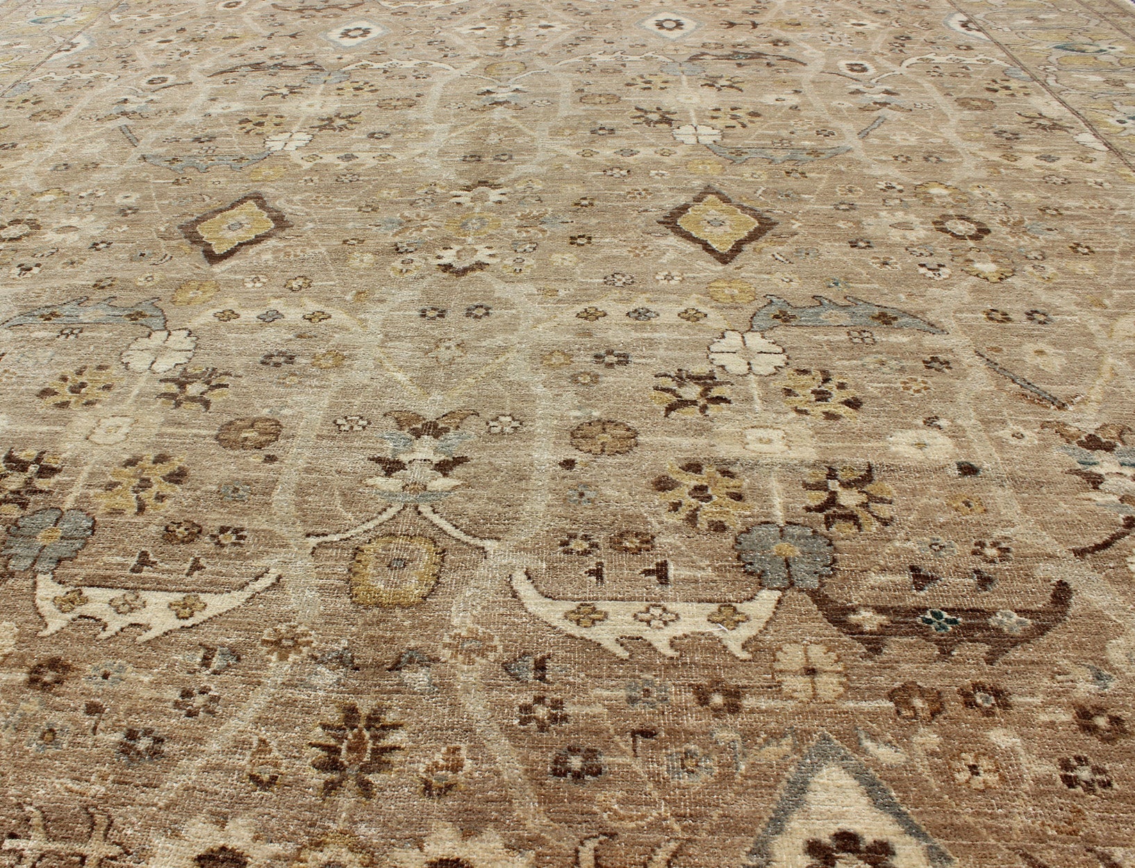 Tabriz Design rug with light Camel Background, Light Brown, tan , Light Brown, Lt. Blue, Yellow. Tabriz Design rug with light Camel Background, Light Brown, tan , Light Brown, Lt. Blue, Yellow, and neutral color palette and all - over flower desig... - Keivan Woven ArtsKOL - 69996 - 8978Rug