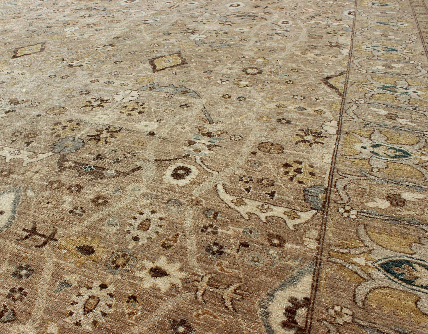 Tabriz Design rug with light Camel Background, Light Brown, tan , Light Brown, Lt. Blue, Yellow. Tabriz Design rug with light Camel Background, Light Brown, tan , Light Brown, Lt. Blue, Yellow, and neutral color palette and all - over flower desig... - Keivan Woven ArtsKOL - 69996 - 8978Rug