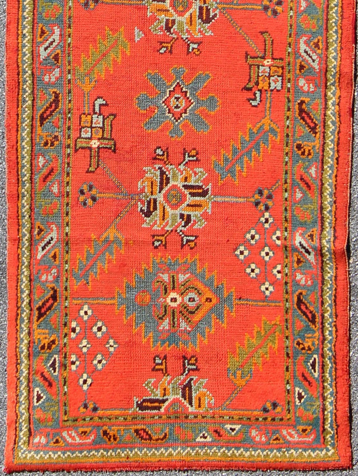 Bright red antique Turkish Oushak runner with Sub - geometric tribal motifs, rug l11 - 0304, country of origin / type: Turkey / Oushak, circa 1920 This antique Oushak runner features a unique blend of cheerful colors and an intricately beautiful des... - Keivan Woven ArtsL11 - 0304 - 2537Rug