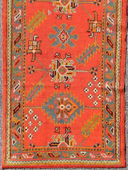 Bright red antique Turkish Oushak runner with Sub - geometric tribal motifs, rug l11 - 0304, country of origin / type: Turkey / Oushak, circa 1920 This antique Oushak runner features a unique blend of cheerful colors and an intricately beautiful des... - Keivan Woven ArtsL11 - 0304 - 2537Rug