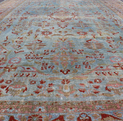 Blue background antique Persian Sarouk rug with red and acid green florals. Keivan Woven Arts / rug L11 - 0305, country of origin / type: Iran / Sarouk Farahan, circa 1910 Measures: 10'11 x 17'2 This outstanding antique Farahan Sarouk carpet (circa... - Keivan Woven ArtsL11 - 0305 - 2573Rug