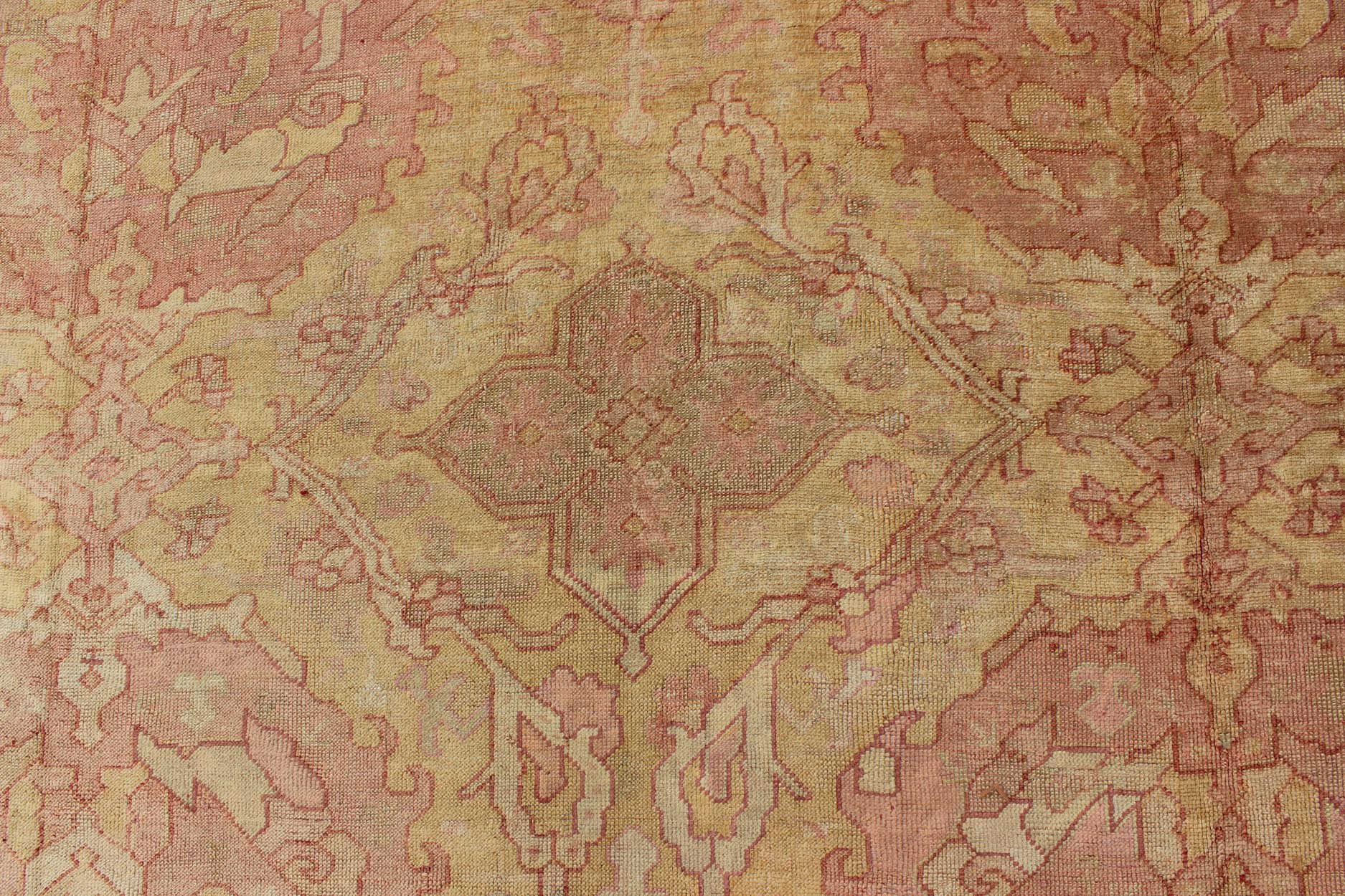 Antique Turkish Oushak rug with large floral motifs in creamy yellow, muted coral, Keivan Woven Arts / rug L11 - 0405 country of origin / type: Turkey / Oushak, circa Early - 20th century. This antique Turkish Oushak carpet features eight central large... - Keivan Woven ArtsL11 - 0405 - 2555Rug