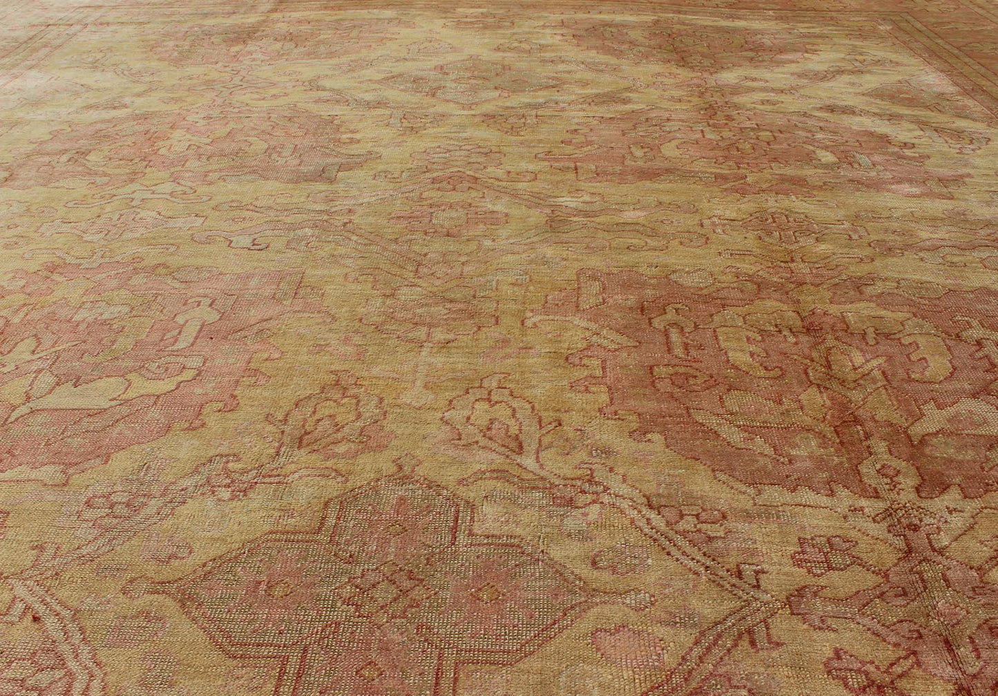 Antique Turkish Oushak rug with large floral motifs in creamy yellow, muted coral, Keivan Woven Arts / rug L11 - 0405 country of origin / type: Turkey / Oushak, circa Early - 20th century. This antique Turkish Oushak carpet features eight central large... - Keivan Woven ArtsL11 - 0405 - 2555Rug