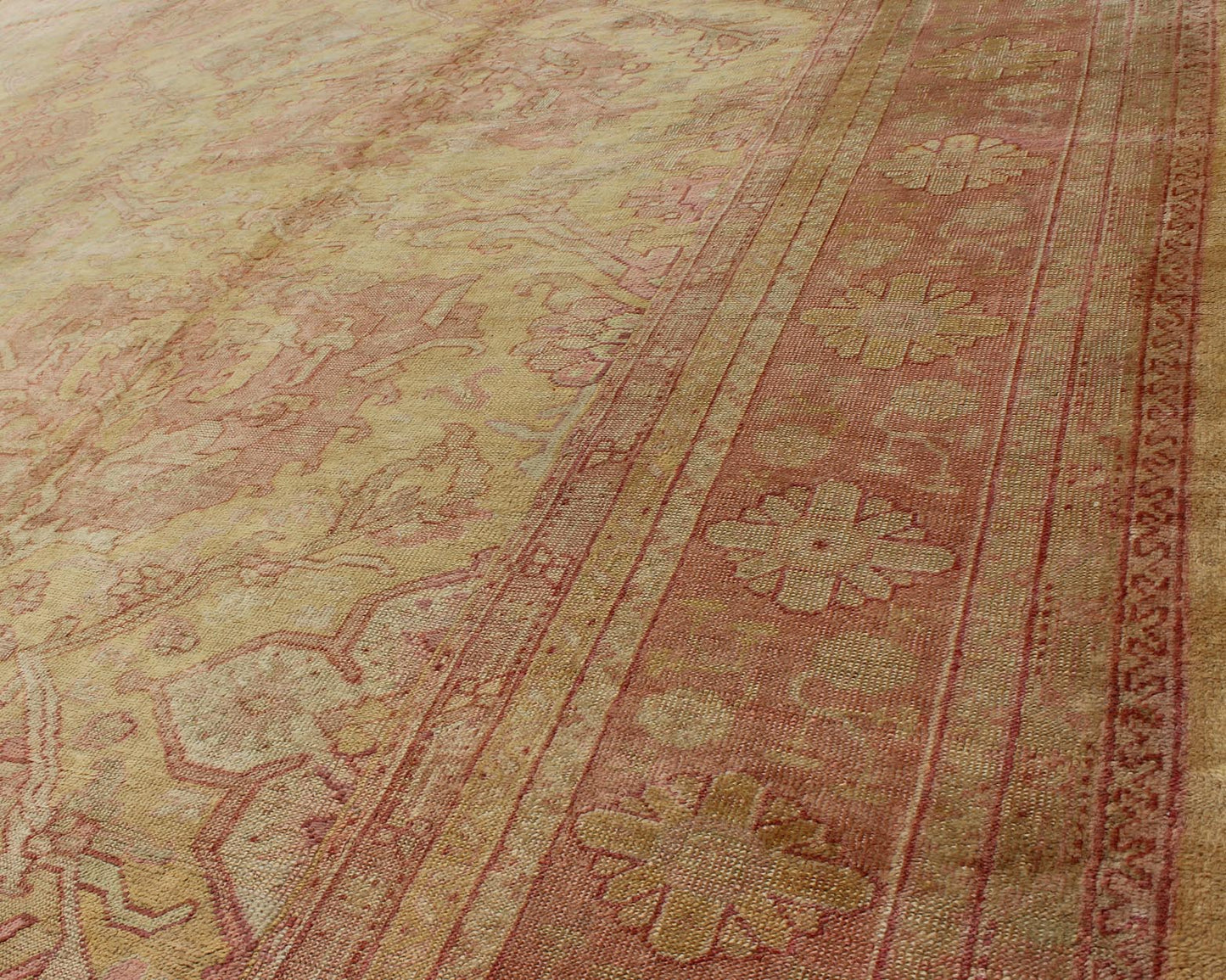 Antique Turkish Oushak rug with large floral motifs in creamy yellow, muted coral, Keivan Woven Arts / rug L11 - 0405 country of origin / type: Turkey / Oushak, circa Early - 20th century. This antique Turkish Oushak carpet features eight central large... - Keivan Woven ArtsL11 - 0405 - 2555Rug