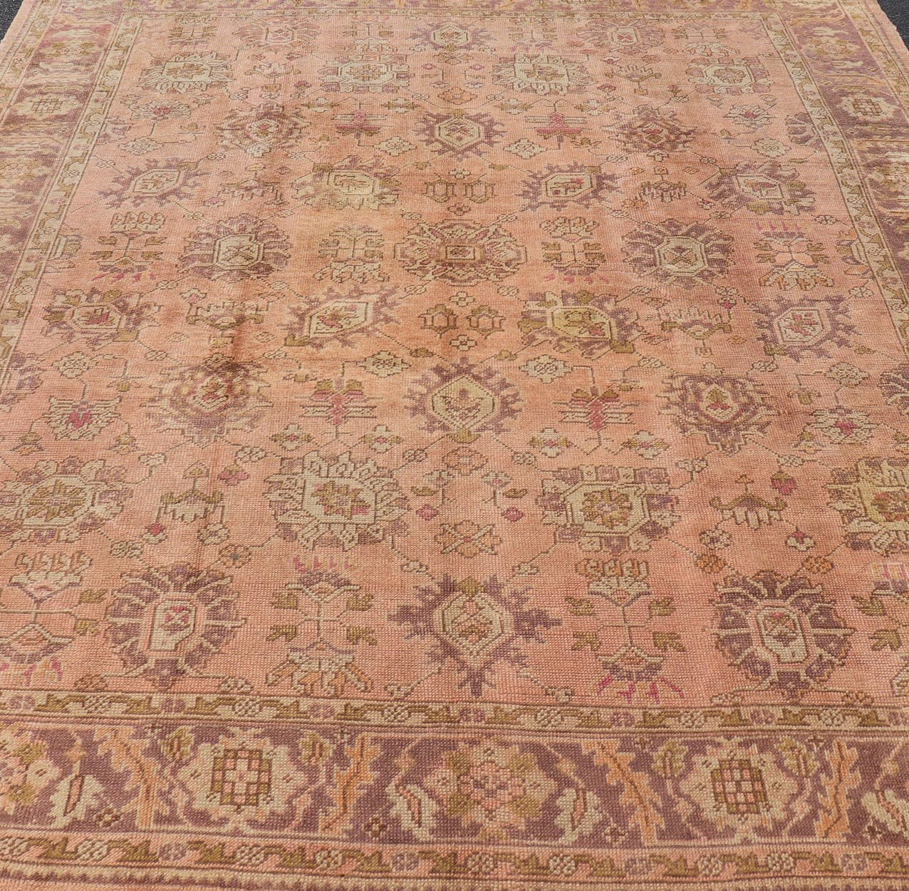 Antique Turkish Oushak Rug with Floral Motifs in Lavender, Coral - Pink, and Green. Keivan Woven Arts / rug L11 - 0406, country of origin / type: Turkey / Oushak, circa Early - 20th century Measures: 8'10 x 11'5. This unique Turkish Oushak carpet featu... - Keivan Woven ArtsL11 - 0406 - 2561Rug
