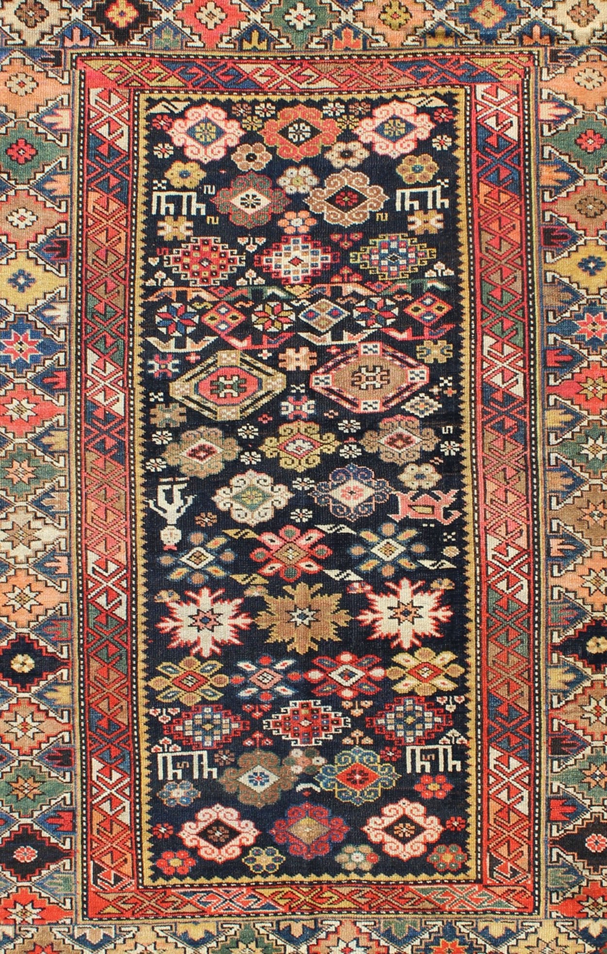 Colorful Antique Kuba Carpet with Intricate Geometric Design This Kuba rug from the southern Caucasus features many diamond medallions in the central field surrounded by multiple borders of geometric design. The diagonal coloring and arrangement... - Keivan Woven ArtsL11 - 0910 - 3716Rug