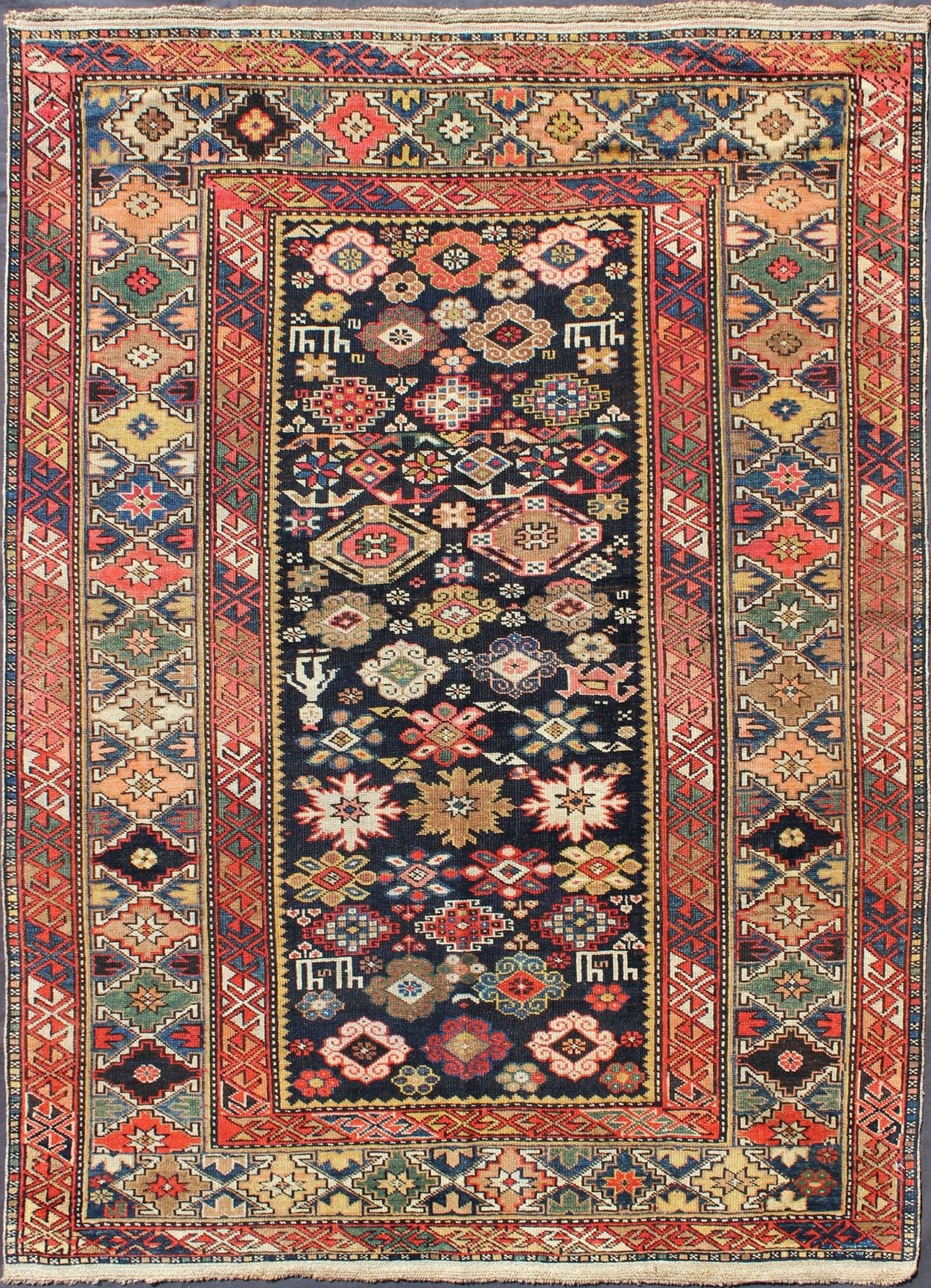 Colorful Antique Kuba Carpet with Intricate Geometric Design This Kuba rug from the southern Caucasus features many diamond medallions in the central field surrounded by multiple borders of geometric design. The diagonal coloring and arrangement... - Keivan Woven ArtsL11 - 0910 - 3716Rug