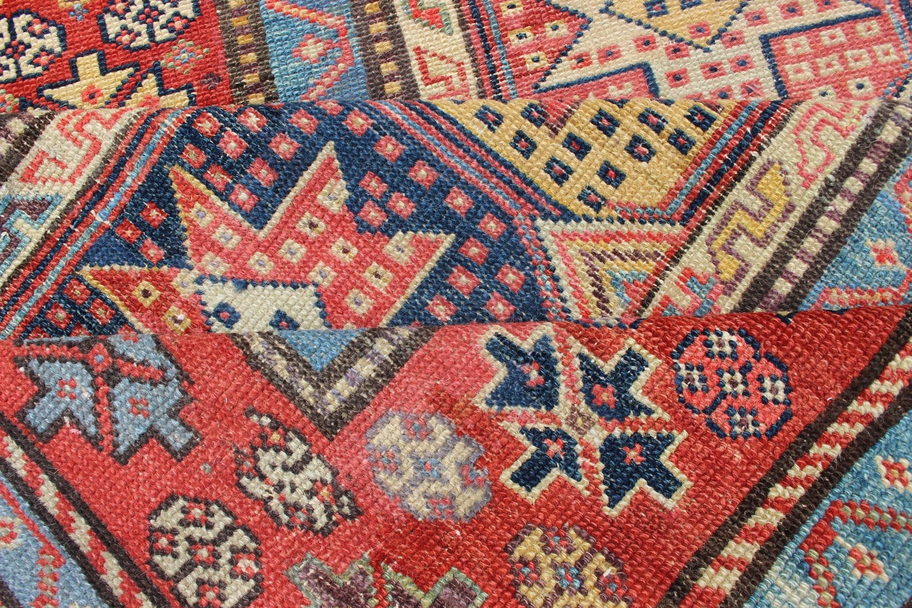 Antique Caucasian Kazak Runner with Medallions in Red, Blue, and Yellow. Keivan Woven Arts / rug L11 - 1205, country of origin / type: Iran / Tribal, circa 1900 Measures: 3'6 x 16. This antique Caucasian Kazak runner features multiple repeating med... - Keivan Woven ArtsL11 - 1205 - 7409Rug