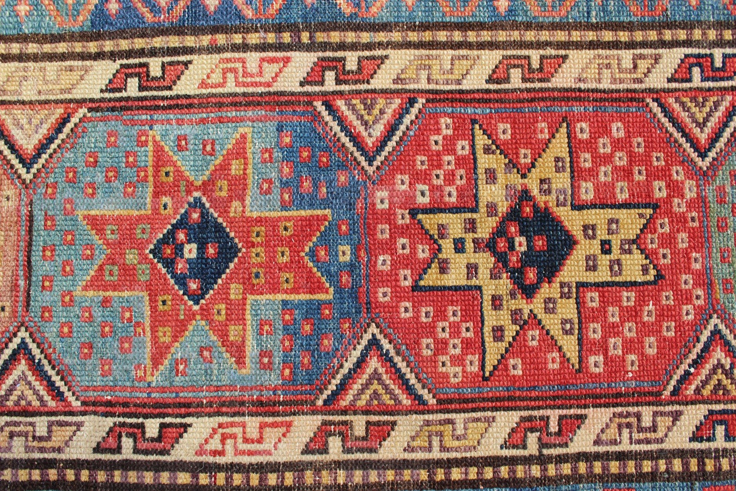 Antique Caucasian Kazak Runner with Medallions in Red, Blue, and Yellow. Keivan Woven Arts / rug L11 - 1205, country of origin / type: Iran / Tribal, circa 1900 Measures: 3'6 x 16. This antique Caucasian Kazak runner features multiple repeating med... - Keivan Woven ArtsL11 - 1205 - 7409Rug