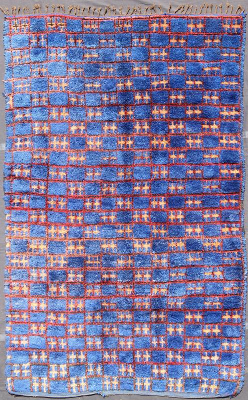 Vintage Moroccan Rug This unique vintage Moroccan carpet is characterized by a saturated, bold blue color and dramatic berber symbols. The alternating checkerboard pattern is outlined in red with tan cross motifs while its thick pile has a soft ... - Keivan Woven ArtsLCB - 136601 - 7309Rug
