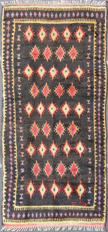 Charcoal Black Background Unique Vintage Moroccan Rug in Red and Yellow Measures: 4'9'' x 9'10''. Featuring a central charcoal field full of red and yellow diamond - shaped motifs, this unique Moroccan rug displays a harmonious and rich color p... - Keivan Woven ArtsLCB - 136610 - 7321Rug