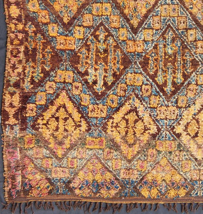 Vintage Square Moroccan Beni Ouarain In Earthy Tones With Pops of Blue and Gold Measures: 7'9'' x 8'4''. This piece is a thick and lush vintage tribal Moroccan carpet which originated from the northern Middle Atlas mountains. The weavers of t... - Keivan Woven ArtsLCB - 136638 - 7329Rug