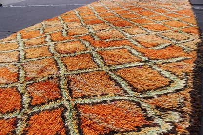 Wide Runner, Vintage Moroccan Gallery Rug with Diamond Design in Orange & Green Measures: 4'10'' x 11'4''. This piece is an extremely lively and colorful vintage Moroccan gallery rug. Featuring lush wool, it was woven in the High Atlas Mount... - Keivan Woven ArtsLCB - 136648 - 7341Rug