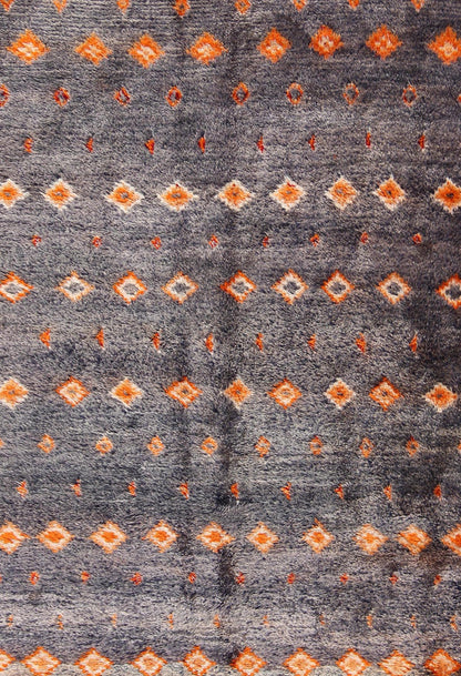 Charcoal and Orange Vintage Moroccan Rug with Geometric Design Moroccan Vintage Rug with Orange Geometric Design Rendered on a Variegated Charcoal Field, rug lcb - 18 - 79, country of origin / type: Morocco / Tribal, circa 1940. Crafted in t... - Keivan Woven ArtsLCB - 18 - 79 - 9587Rug