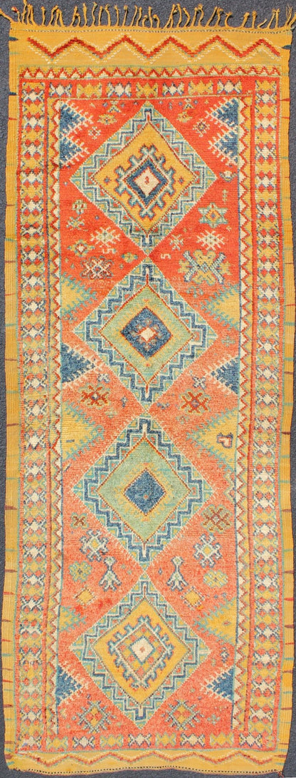 Colorful Moroccan Runner in Orange, Blue, Yellow and Gold Colors. Keivan Woven Arts / rug LCB - 571, country of origin / type: Morocco / Tribal, circa 1950 Rendered with four medallions and random shapes of spotted and speckled with an assortment ... - Keivan Woven ArtsLCB - 571 - 5301Rug
