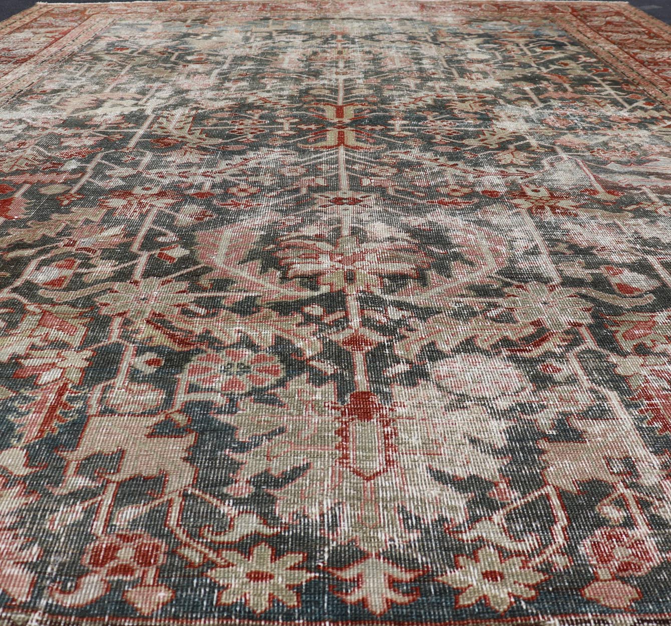 Persian Antique Heriz Rug with All - Over Geometric Design in Gray - Blue and Red. Keivan Woven Arts / Rug / LH - A38498, country of origin / type: Iran /Heriz, circa 1910. Measures: 8'5 x 11'2 This lovely Antique Heriz rug, hailing from northwestern... - Keivan Woven ArtsLH - A38498 - 1841Rug