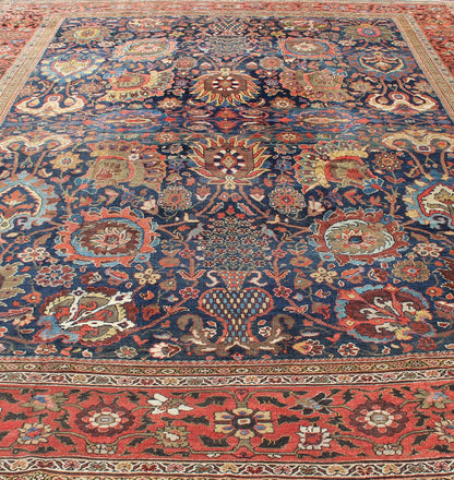 Exceptional Large Antique Sultanabad Rug in Midnight Blue and Coral Red. Keivan Woven Arts / rug M14 - 0305, country of origin / type: Iran / Sultanabad, circa 1900. Measure: 13.1 x 17.1. This exceptional antique Sultanabad showcases a marvelous l... - Keivan Woven ArtsM14 - 0305 - 6320Rug