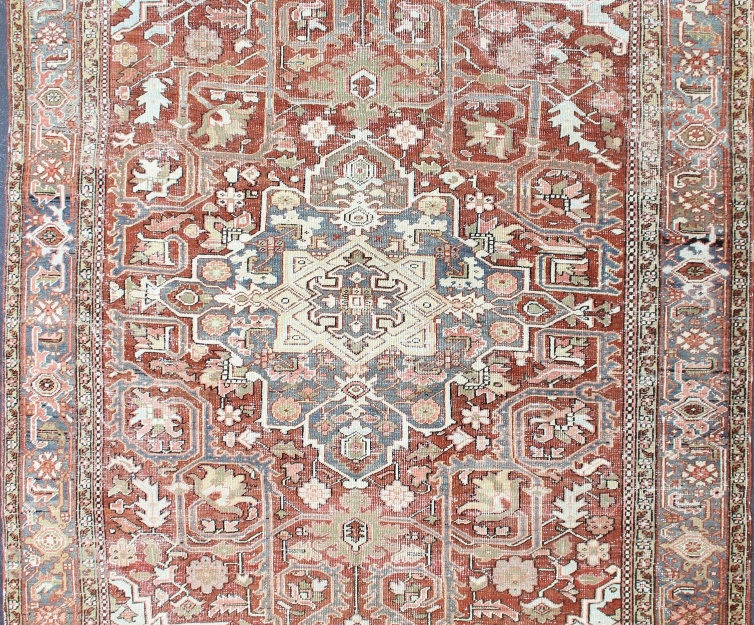 Persian Antique Heriz in Soft Red, Gray Blue, Pale Green & Geometric Design. Measures: 7'6 x 10'8 Gray blue, soft green, soft red Persian Heriz with geometric medallion design,rug M14 - 0513, country of origin / type: Iran / Heriz, circa ... - Keivan Woven ArtsM14 - 0513 - 5393Rug