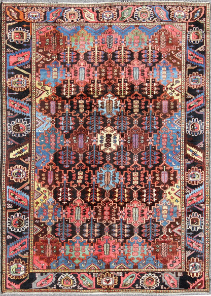 Vintage Persian Bakhtiari Rug This vintage Bakhtiari has an all - over garden pattern. The repeating border of flowers and vines include yellow, blue and red set on a brown background. Measures: 7'3 x 9'7. - Keivan Woven ArtsM14 - 0514 - 5385Rug