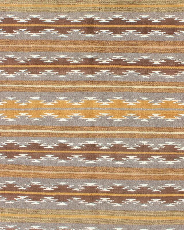 Earthy Tones USA Navajo Kilim rug with Black Border Tribal Design 1940s Navajo Tribal Kilim with geometric design in Marigold, grey and black rug M14 - 0902, country of origin / type: America / Navajo, circa 1940 This intriguing antique Nav... - Keivan Woven ArtsM14 - 0902 - 5930Rug