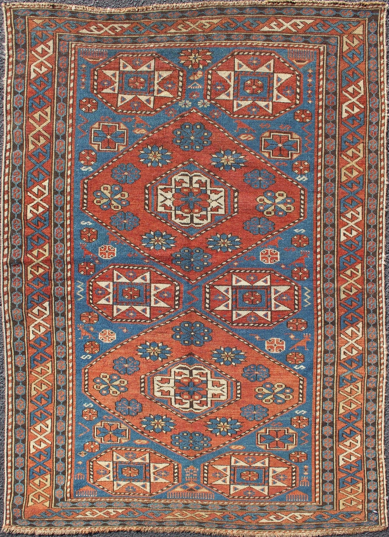 Antique Caucasian Shirvan Rug with Geometric Design in Brunt Orange and Blue. Keivan Woven Arts / rug 11 - 91002, country of origin / type: Caucus / Shirvan, circa 1890. Measures: 3'6 x 5'1. This stunning late 19th century antique Shirvan rug from ... - Keivan Woven ArtsM14 - 0905 - 5938Rug