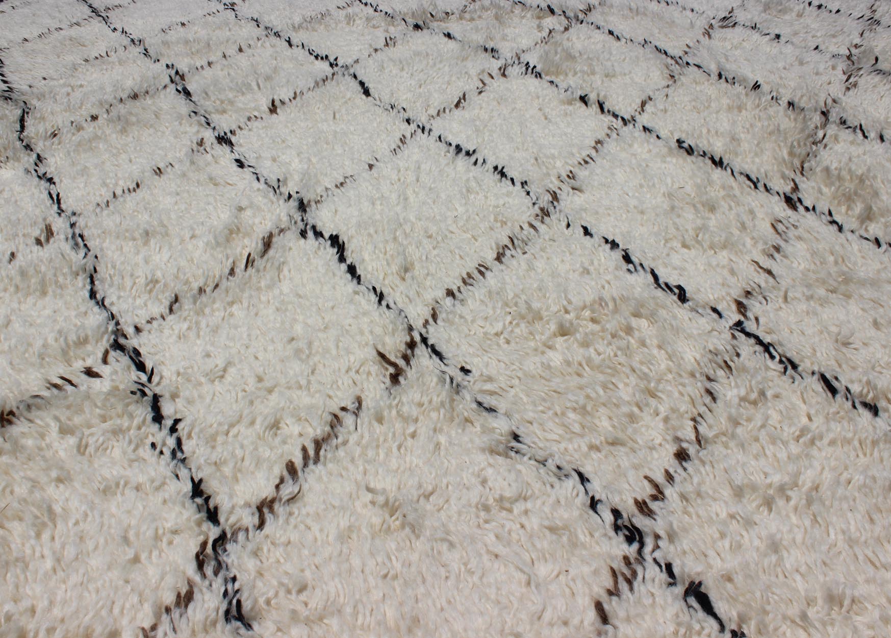 Large Vintage Moroccan Rug in Off White Background by Keivan Woven Arts. Large Vintage Moroccan Beni Ourain Rug in Off White Background, Black and Brown lines. M14 - 1001. Measures: 9'4" x 12' This vintage Moroccan Berber rugs with d... - Keivan Woven ArtsM14 - 1001 - 27712Rug