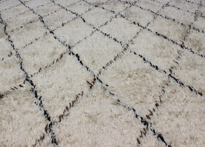 Large Vintage Moroccan Rug in Off White Background by Keivan Woven Arts. Large Vintage Moroccan Beni Ourain Rug in Off White Background, Black and Brown lines. M14 - 1001. Measures: 9'4" x 12' This vintage Moroccan Berber rugs with d... - Keivan Woven ArtsM14 - 1001 - 27712Rug