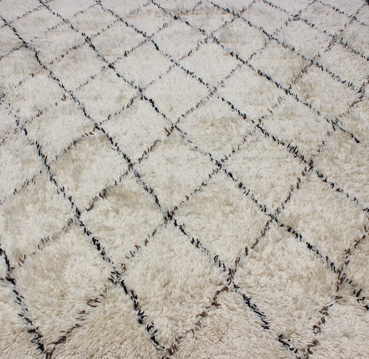 Large Vintage Moroccan Rug in Off White Background by Keivan Woven Arts. Large Vintage Moroccan Beni Ourain Rug in Off White Background, Black and Brown lines. M14 - 1001. Measures: 9'4" x 12' This vintage Moroccan Berber rugs with d... - Keivan Woven ArtsM14 - 1001 - 27712Rug