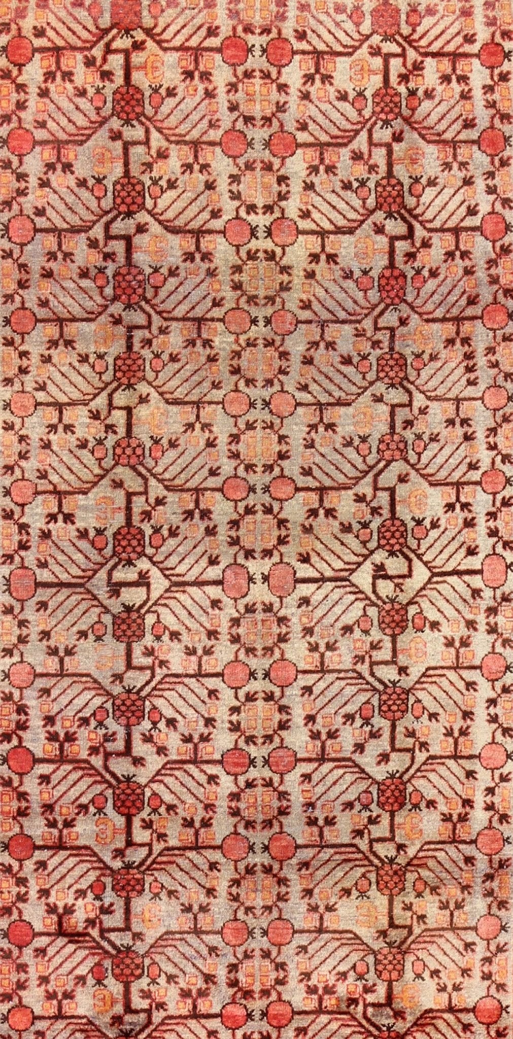 Antique Khotan Rug This attractive antique Khotan rug is a spectacular testament to the complexity of Turkestan design. The neutral tone of the central field plays host to a stunning display of the entwined tree of life bearing budding blossoms ... - Keivan Woven ArtsMP - 1301 - 339 - 3984Rug