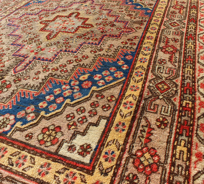 Colorful Antique Khotan Rug With Multi Layered Medallion Taupe background antique Khotan rug with repeating layered medallion pattern. Keivan Woven Arts / rug MP - 1301 - 434, country of origin / type: East Turkestan / Khotan, circa 1920 This e... - Keivan Woven ArtsMP - 1301 - 434 - 3974Rug