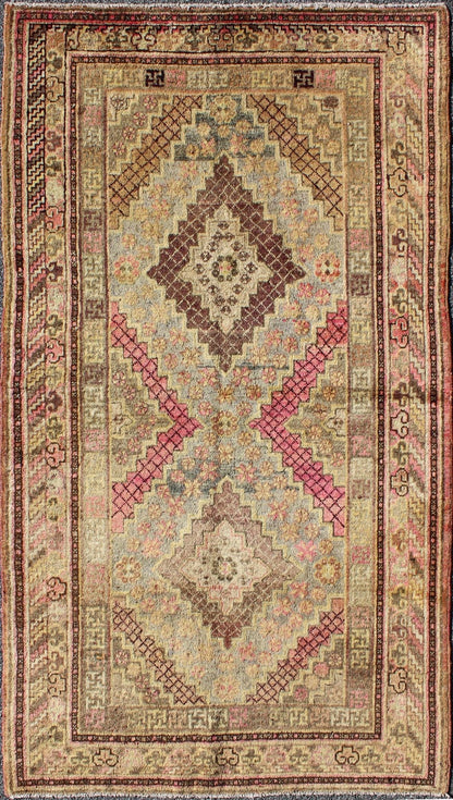 Early 20th Century Antique Khotan Rug with Paired Diamond Medallions in Wine Red, rug mp - 1301 - 519, country of origin / type: East Turkestan / Khotan, circa 1920 This delicately rendered antique Khotan rug was handcrafted in Turkestan during the ... - Keivan Woven ArtsMP - 1301 - 519 - 3970Rug