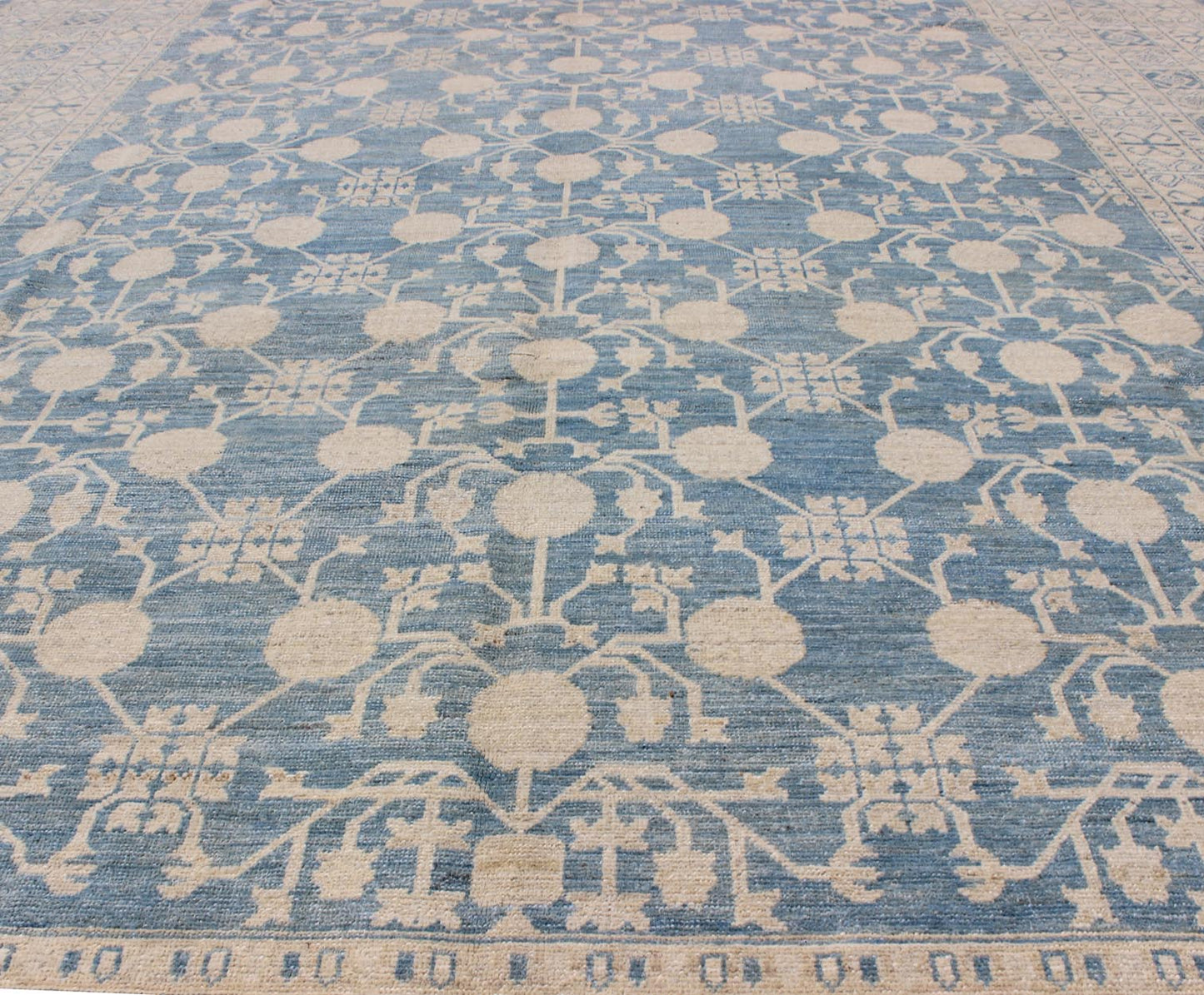 Large Pomegranate Design Modern Khotan Rug in Light Blue and Cream. Keivan Woven Arts / rug MP - 1309 - 655, country of origin / type: Afghanistan / Khotan. Measures: 8'7 x 12'5 This Khotan features an all over Pomegranate design flanked by a repeat... - Keivan Woven ArtsMP - 1309 - 655 - 4714Rug