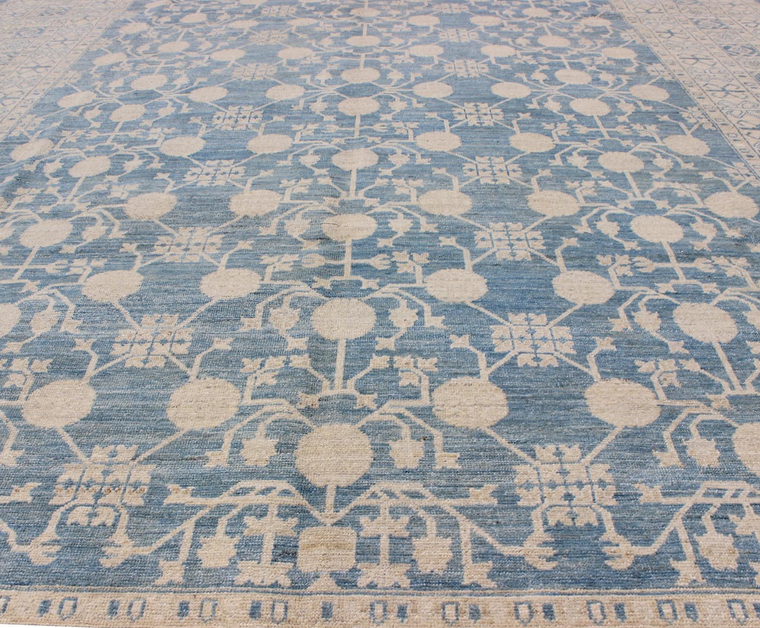 Large Pomegranate Design Modern Khotan Rug in Light Blue and Cream. Keivan Woven Arts / rug MP - 1309 - 655, country of origin / type: Afghanistan / Khotan. Measures: 8'7 x 12'5 This Khotan features an all over Pomegranate design flanked by a repeat... - Keivan Woven ArtsMP - 1309 - 655 - 4714Rug
