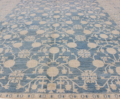 Large Pomegranate Design Modern Khotan Rug in Light Blue and Cream. Keivan Woven Arts / rug MP - 1309 - 655, country of origin / type: Afghanistan / Khotan. Measures: 8'7 x 12'5 This Khotan features an all over Pomegranate design flanked by a repeat... - Keivan Woven ArtsMP - 1309 - 655 - 4714Rug
